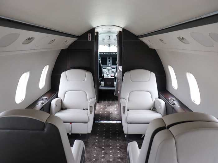 The forward section seats four with two pairs of club seats, a classic configuration found on nearly every private jet.