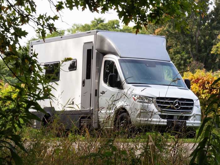 The cabin box is about three inches wider than the widest part of the van.