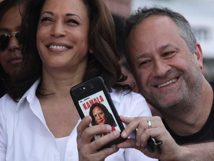 Before Kamala Harris went on stage to speak at the fair, her husband, Doug Emhoff, snapped a selfie and showed off his campaign swag phone case.