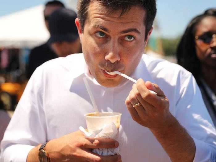 Pete Buttigieg tasted a root beer float while talking to reporters.