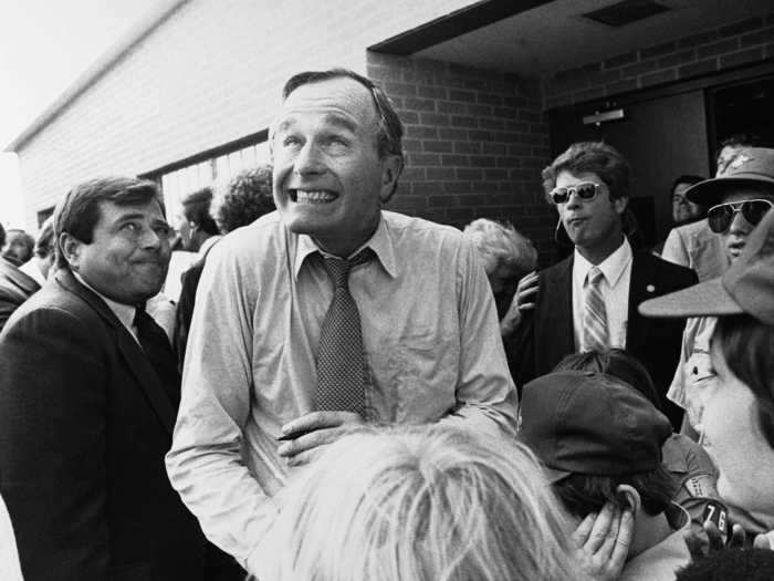 George H.W. Bush gave a cheesy grin while campaigning during his first presidential run in 1980.