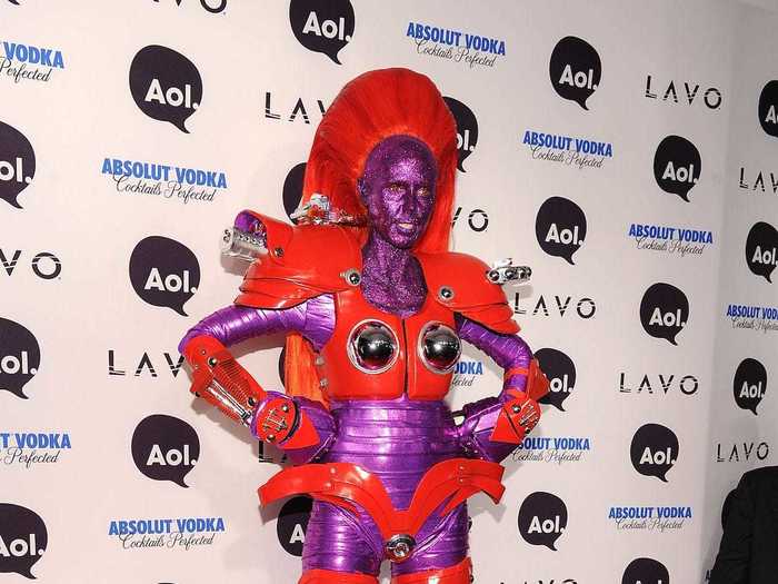 Klum towered over her guests as a superhero-robot on stilts in 2010.