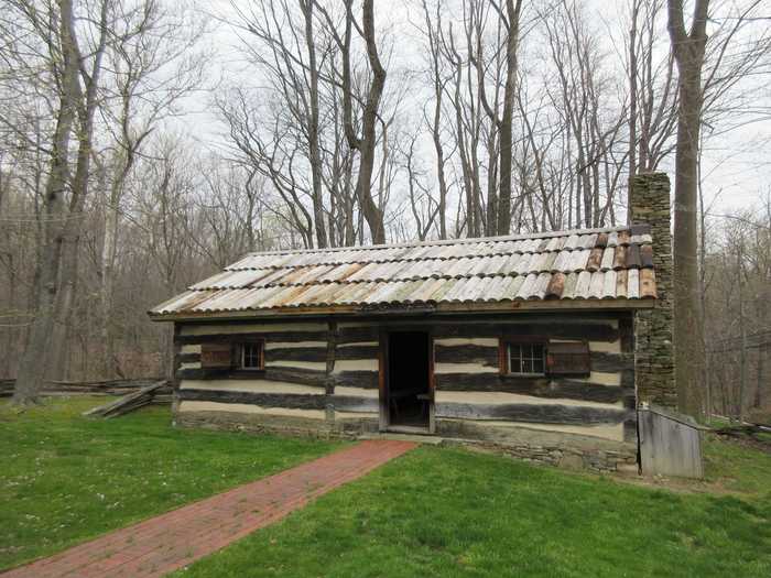 A replica shows the modest log cabin where future president James Garfield was born.