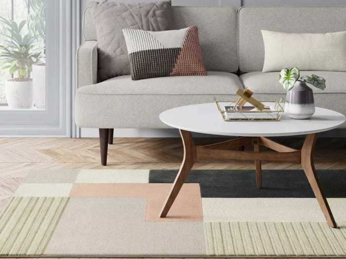 This tufted area rug can add a bold and fresh pattern to your home.