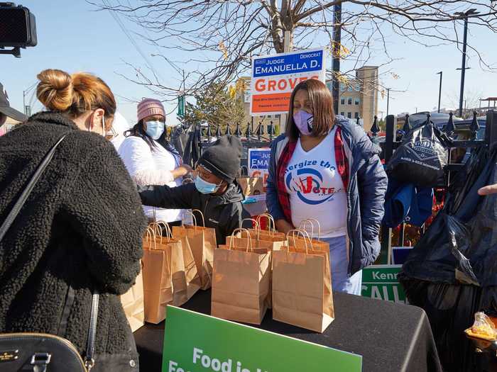 People give out food outside the Board of Elections in Cleveland, Ohio, on October 31, 2020.