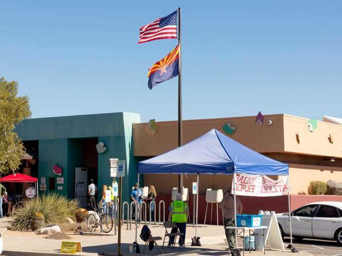 Early voters start to line up at Woods Library in Tucson, Arizona, on October 30, 2020.