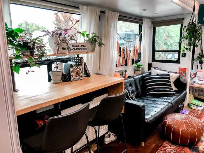 The living room also has a multifunctional table for Charlie and Emily.