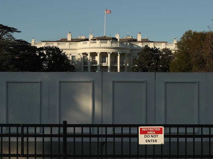 Access to the White House has been severely restricted with a non-scalable wall partially hiding the South Lawn and iconic South Portico.