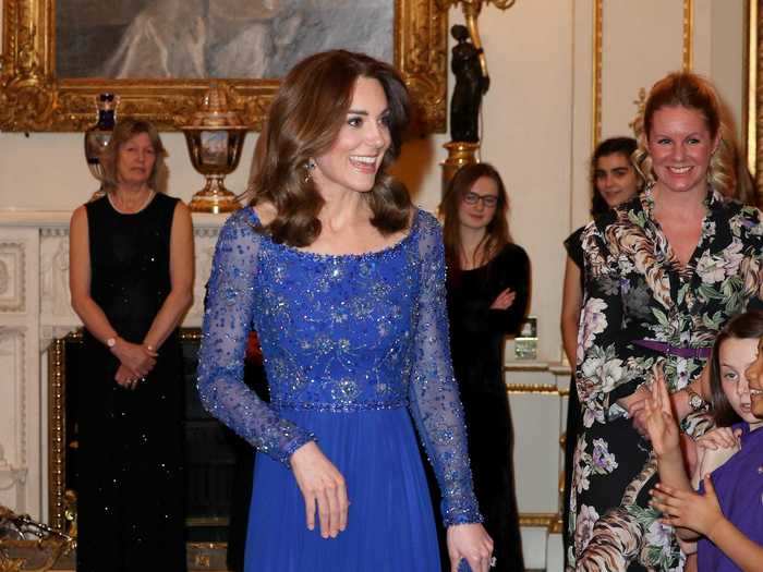 For a gala dinner in Mumbai, India, in March, Middleton wore a Jenny Packham dress that was customized with beads from a local designer.