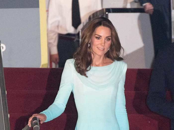 During a visit to Pakistan, Middleton wore a custom-made ombré outfit from Catherine Walker.