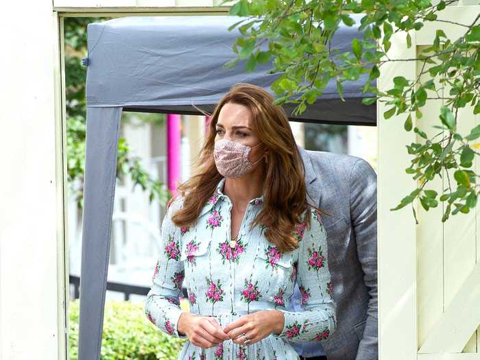 She wore the face mask again with a floral dress by Emilia Wickstead while visiting Shire Hall Care Home.