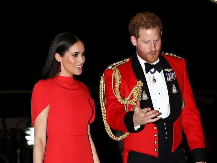 Markle matched Prince Harry in bright red at the Mountbatten Festival of Music in March.