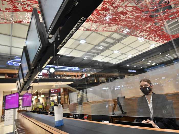 Plexiglass partitions now found at the check-in counters, and all passengers must wear masks.