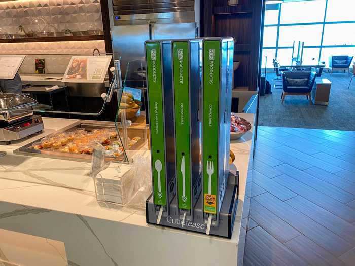 A single-serving cutlery dispenser provides forks, knives, and spoons, although the green towers didn