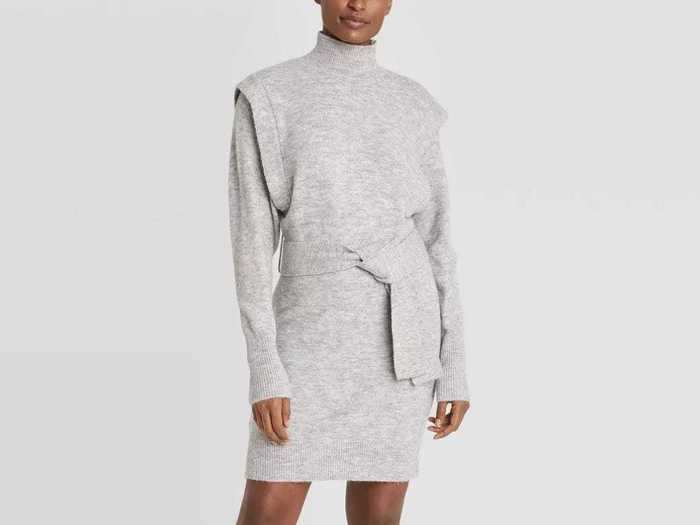 This sweater dress features strong shoulder details for some added visual interest.