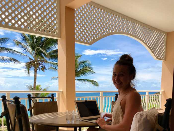 The balcony had ocean views and both a dining table and two sun loungers.