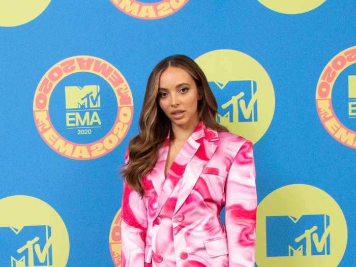 Jade Thirlwall did the same in a pink, patterned outfit and clear shoes.