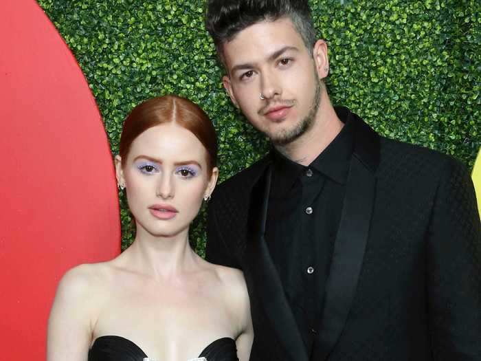 "Riverdale" star Madelaine Petsch and musician Travis Mills amicably broke up after a three-year relationship.