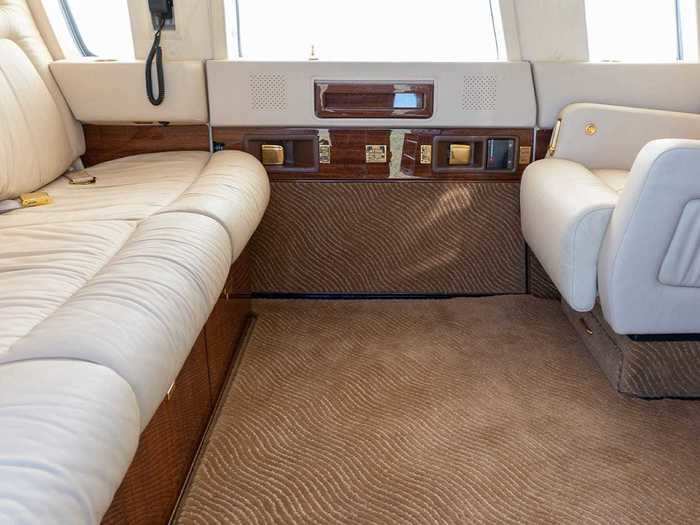 The headliner and window panels are covered in "cream ultra" suede while the carpet is custom-made from Scott Group, known as "dual tan Saint John