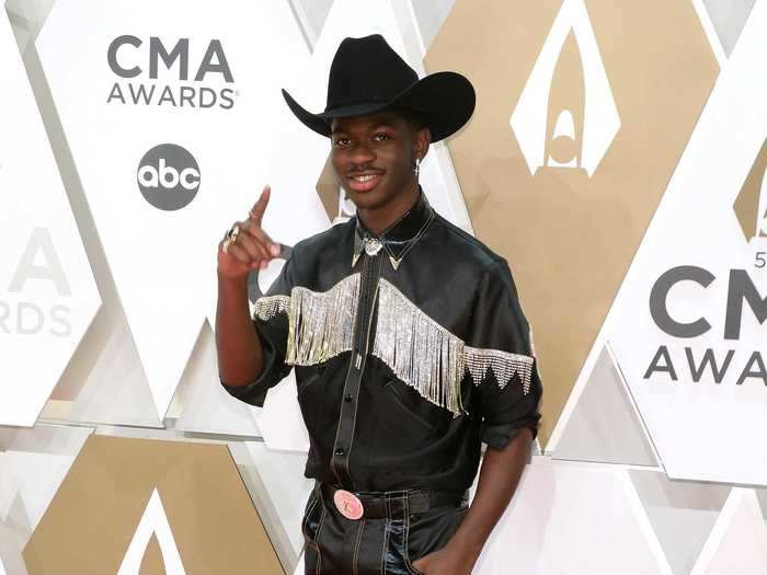 Lil Nas X took the country world by storm in 2019, and walked the red carpet with a snazzy look to match.