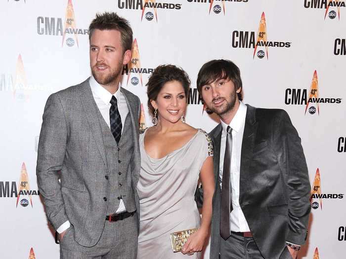 Charles Kelley, Hillary Scott, and Dave Haywood of Lady A (formerly Lady Antebellum) walked the red carpet in shades of gray in 2009.