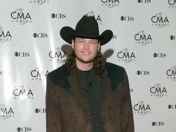 Blake Shelton sported shoulder-length hair under a black cowboy hat at the 2003 CMAs.