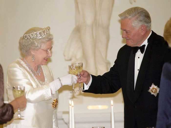 Her Majesty shares a drink with the royal family