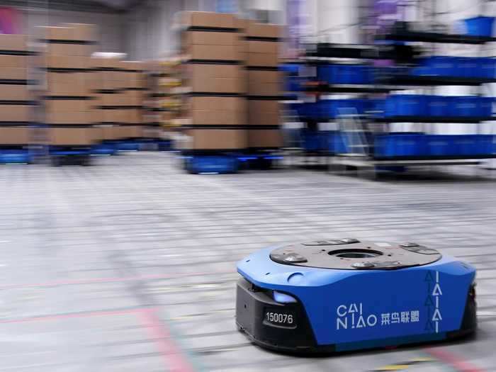 The Wuxi warehouse has 700 robot mail processors, called automated guided vehicles.