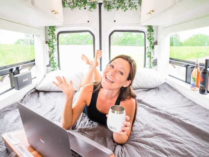 The van has a convertible bed and workspace.