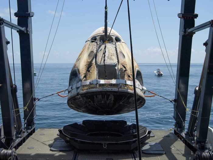 Once the Crew Dragon capsule is bobbing in the water, recovery boats will drive out to greet them.