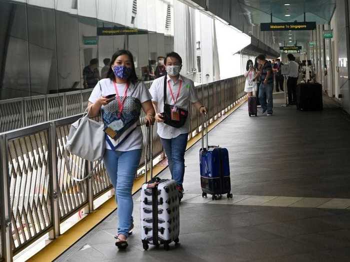 After their COVID-19 tests, guests were able to board the ship, but were required to socially distance and wear masks.