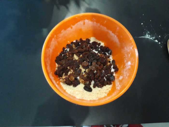 I rubbed the butter, flour, and salt together before adding in the sugar, walnuts, raisins, and cherries.