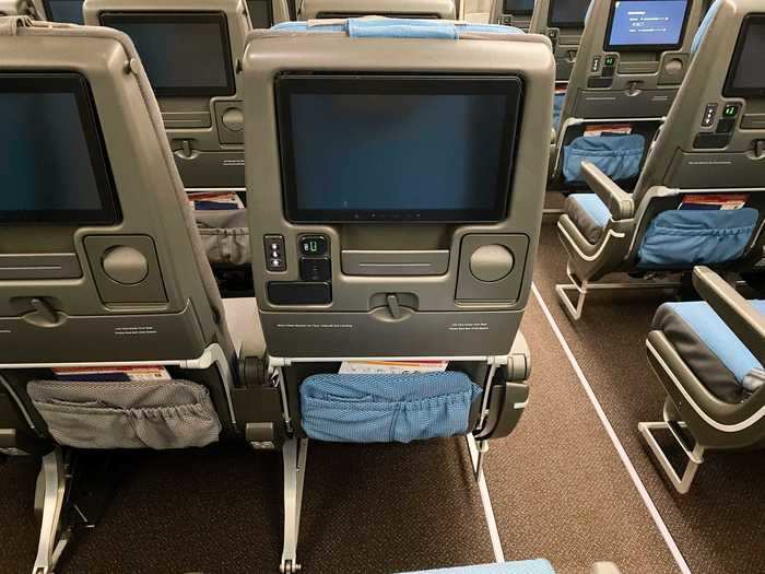 There are also touch-screen in-flight entertainment systems with 11-inch screens. There are no remotes at these seats but the system does have device pairing capabilities.