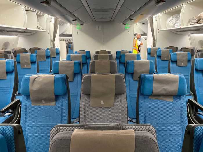It starts with a small six-seat cabin housing 51 seats, bordered by the premium economy section and a row of lavatories.