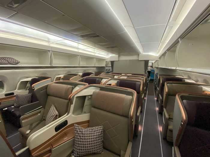 The business class cabins occupy the first 11 rows, arranged in a 1-2-1 configuration.
