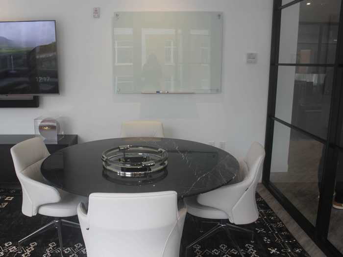 ... and a glossy conference table for meetings.