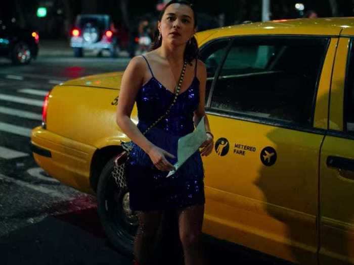 Lily wears just a dress and boots to go out at night in December in NYC when there