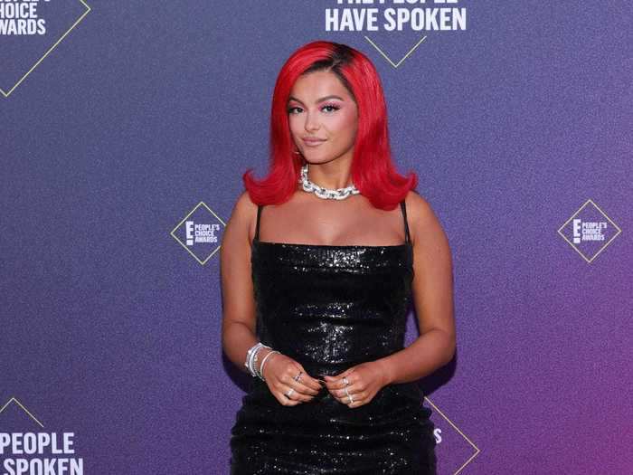 Bebe Rexha arrived in a sparkling minidress and fiery hair.