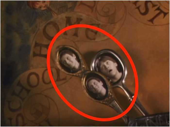 The clock arms are made from scissor handles, Fred and George share an arm because they