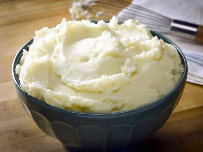 You can make the mashed potatoes a few hours before dinner, and then keep them warm on the stovetop.