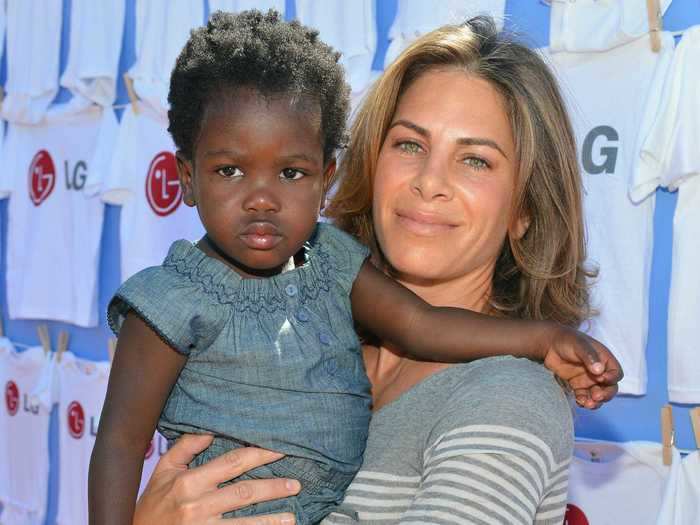 Jillian Michaels adopted her daughter from Haiti the same month her then-fiancée gave birth to their daughter.