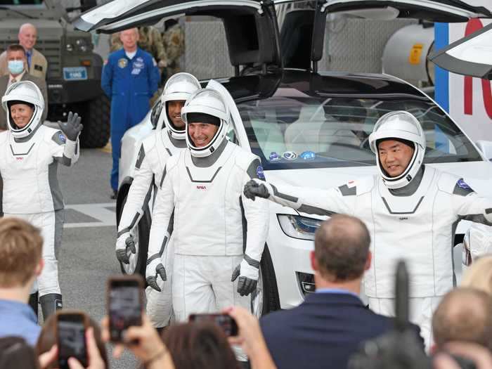 Before launch, the astronauts got dressed in their spacesuits and said goodbye to their families. They drove to the launchpad in specialized Teslas.