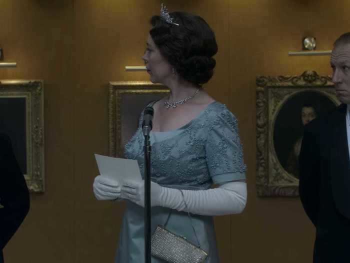 Olivia Colman steps up as Queen Elizabeth in this iconic gown.