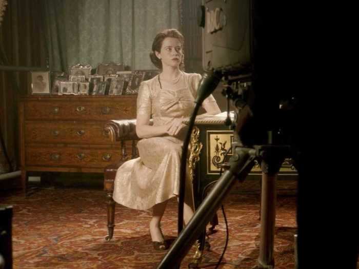 The queen wears a champagne-colored dress for a televised Christmas message.