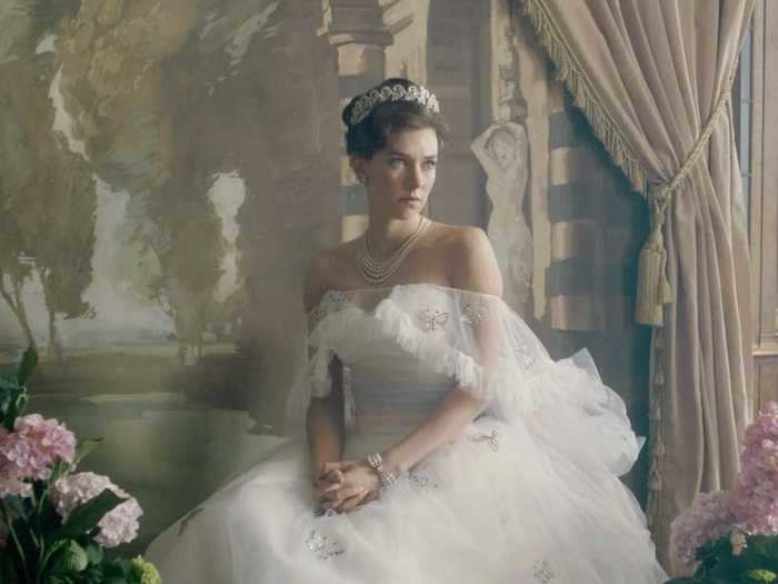 Princess Margaret sits for her portrait in a butterfly-embellished gown.