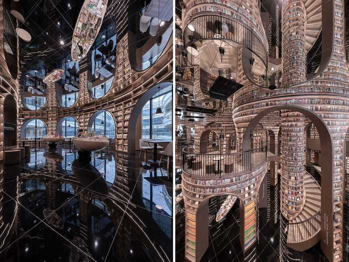 The two-story space designed by Shanghai-based studio X+Living is lined with row after row of glowing shelves that appear to extend indefinitely thanks to mirrored ceilings and a shiny black tiled floor.