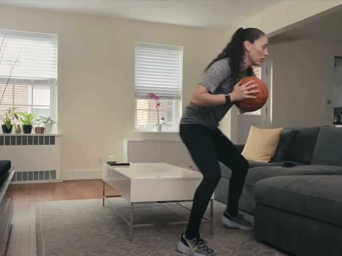 And Sue working on basketball drills in the living room.