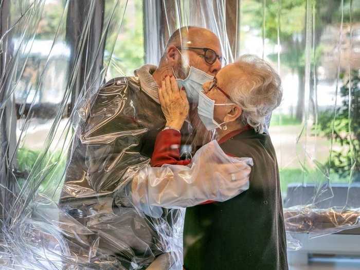 November 11: Relatives hugged through a plastic sheet at a care home in Castelfranco Veneto, Italy.