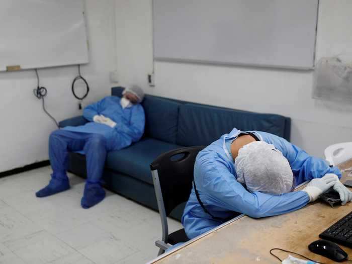 October 29: Exhausted healthcare workers rested after treating COVID-19 patients in Hospital Juarez de Mexico in Mexico City, Mexico.