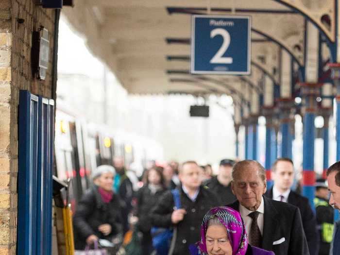 She waits for trains at the station.